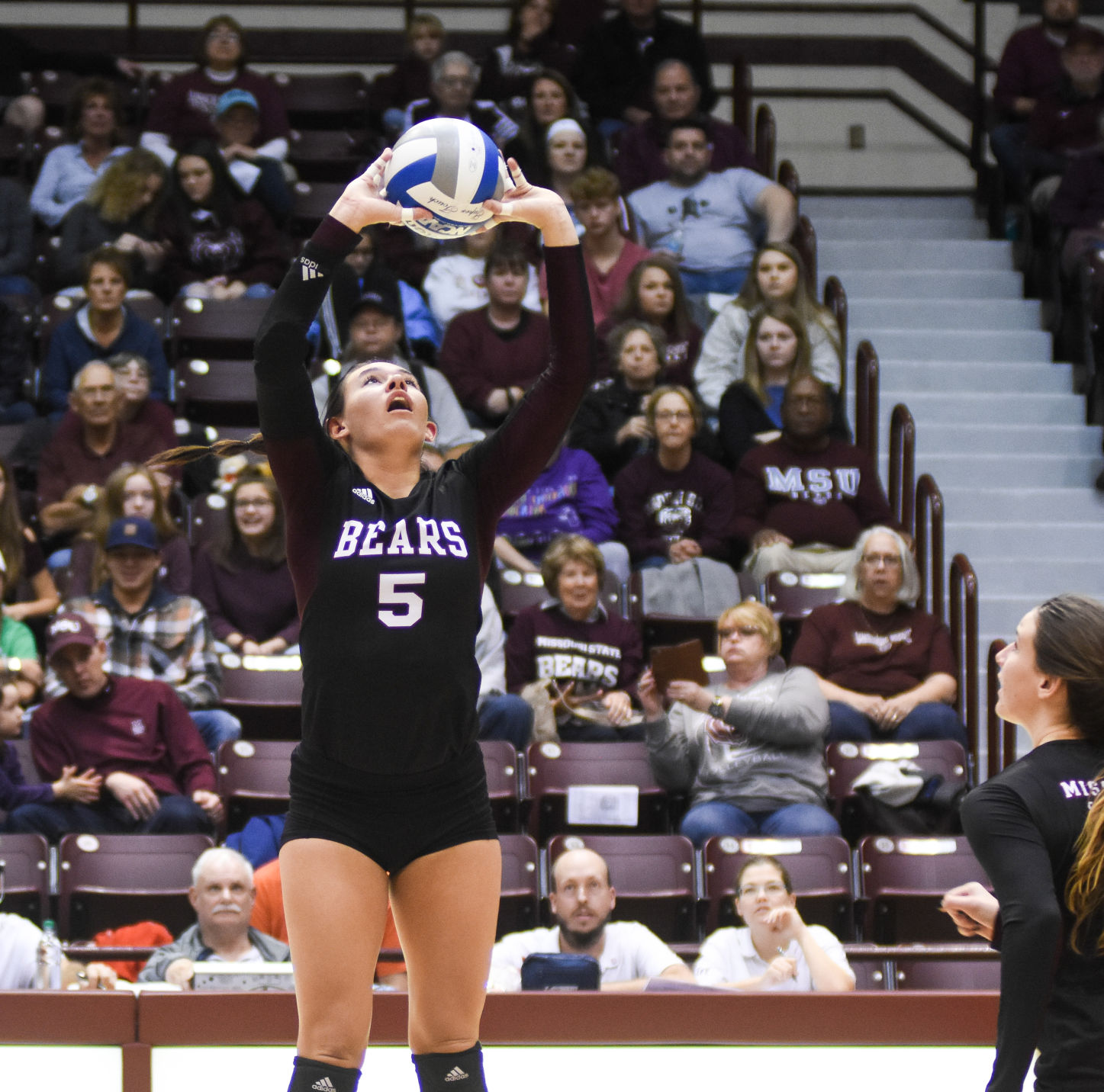Chloe Rear sets the ball